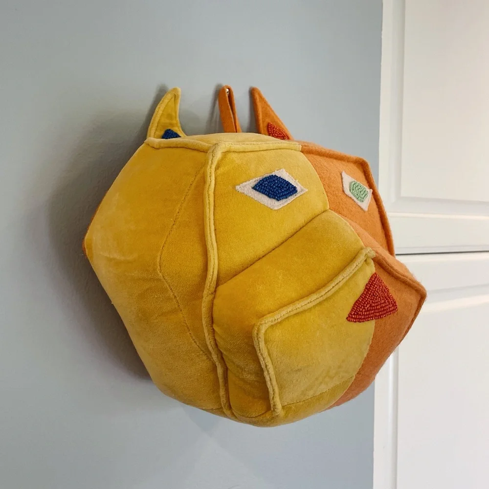 Domino x Crate & Barrel colorful dog head wall decor